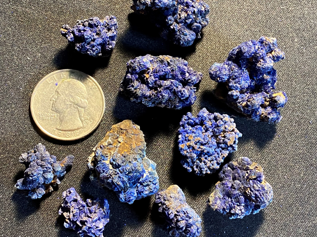 Azurite crystal clusters can often form in nodules, like these two from the Atlas Mountains in Morocco.  Be sure to check out the rest of our 10 gram parcels of Azurite nodules, too.