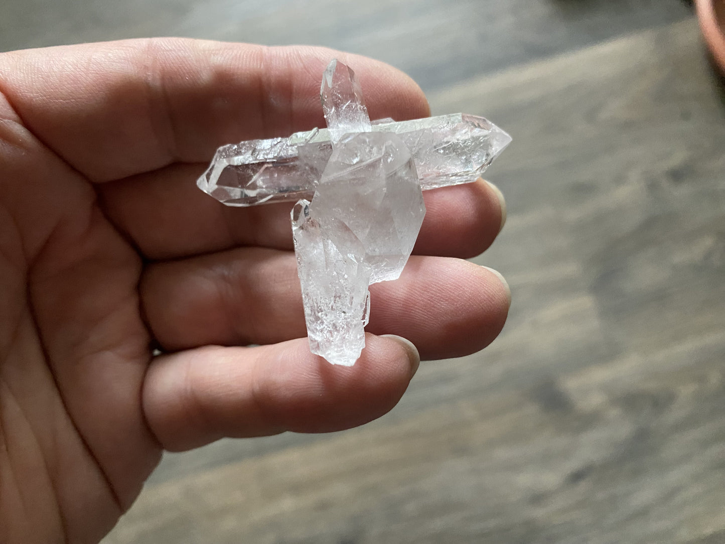 From Corinto, Brazil, this natural clear quartz cross cluster is stunning! It radiates harmony and understanding! Priced to sell. 
