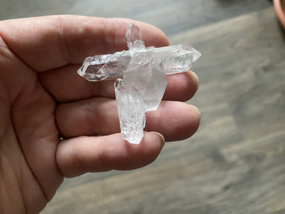 From Corinto, Brazil, this natural clear quartz cross cluster is stunning! It radiates harmony and understanding! Priced to sell. 