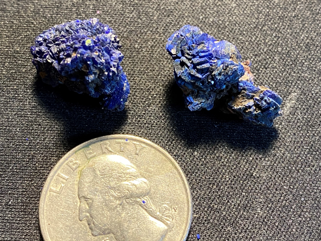 This parcel is typical of Azurite crystal clusters from the Atlas Mountains in Morocco.  The crystal clusters often form as self-contained nodules.  Check out the rest of our 10 gram parcels of Azurite nodules, too.