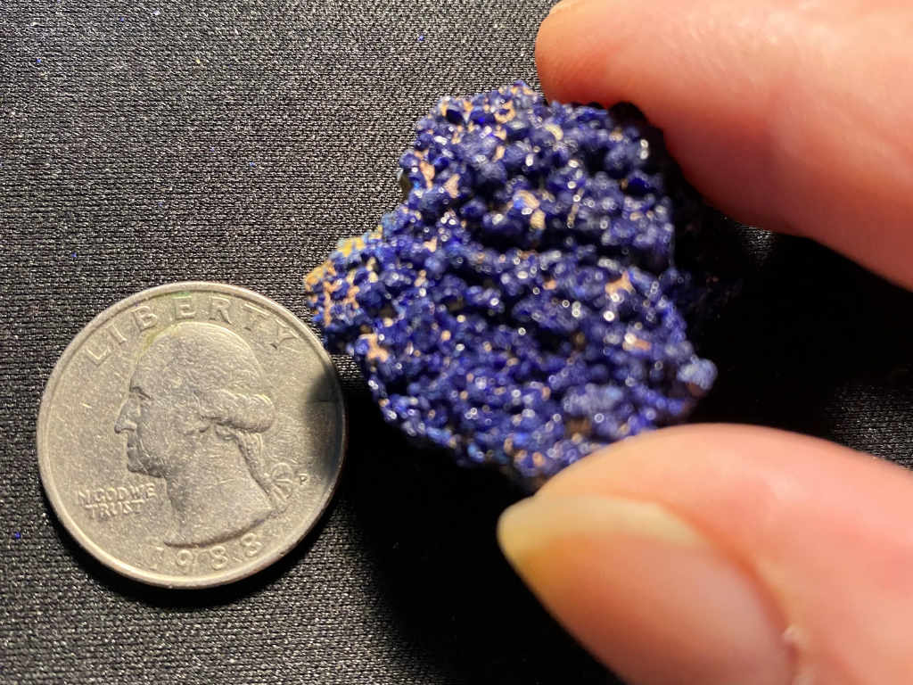 This azurite crystal cluster with some clay is from the Moroccan Atlas Mountains